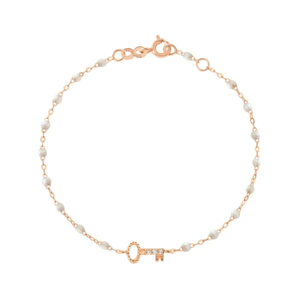 bracelet gigi clozeau en or rose motif clé diamants perles de résine couleur opale