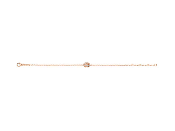 Bracelet de la collection Liens Séduction par la marque française de joaillerie Chaumet en or rose 18 carats, diamants. Chaîne et motif noeud au centre.